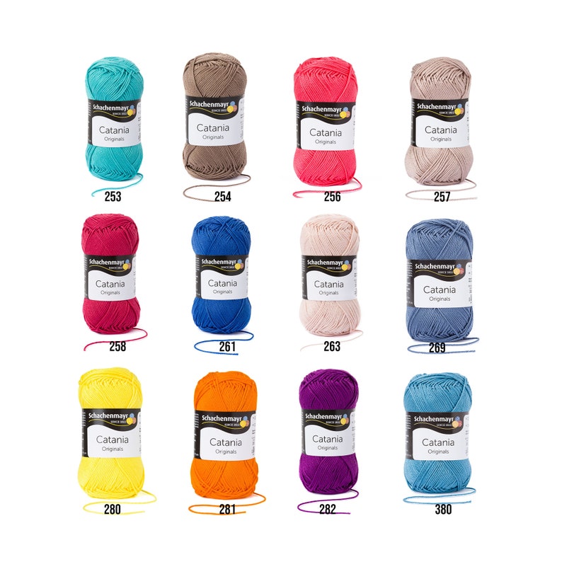 May include: A collection of 10 balls of Schachenmayr Catania Originals yarn in various colours, including teal, brown, red, pink, blue, yellow, orange, purple, and light blue. Each ball is labelled with the Schachenmayr logo and the yarn name.