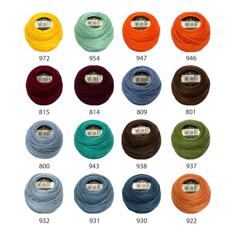 May include: A collection of 12 balls of embroidery floss in various colors, including yellow, green, orange, red, brown, teal, dark brown, olive green, blue, and orange. Each ball has a label with a number.