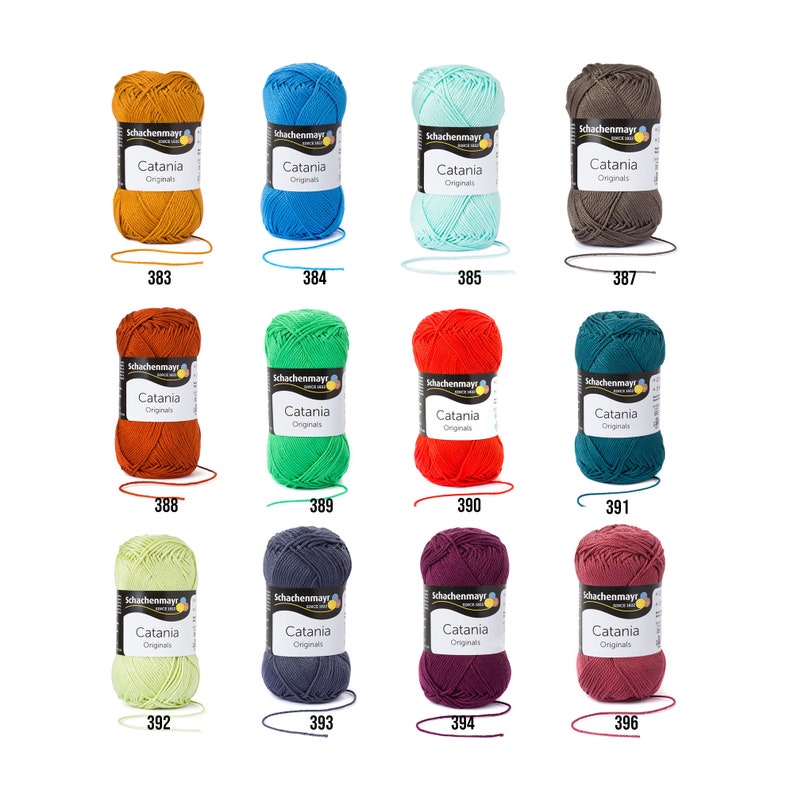 May include: Twelve balls of yarn in various colours, including orange, green, red, teal, light blue, dark blue, purple, brown, and yellow. Each ball has a label that reads "Schachenmayr Catania Originals" and a number.