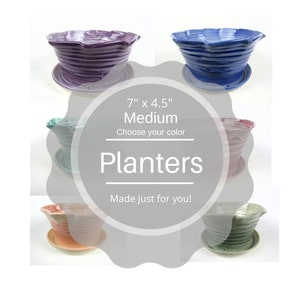 May include: Set of six ceramic planters in various colors, each with a ruffled rim and a matching saucer. The planters are 7 inches in diameter and 4.5 inches tall. The text "7" x 4.5" Medium Choose your color Planters Made just for you!" is displayed on a gray background.