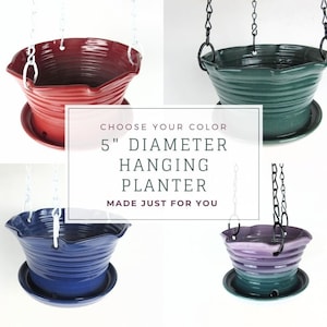 May include: Four 5 inch diameter hanging planters with ruffled edges. The planters are available in red, green, blue, and purple.  "Choose your color 5" Diameter Hanging Planter Made just for you"