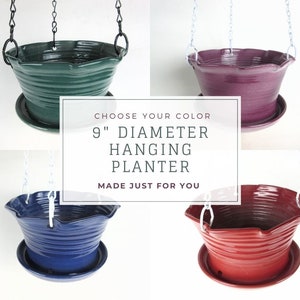 May include: Four 9-inch diameter hanging planters in different colors: green, purple, blue, and red.  Choose your color.  Made just for you.