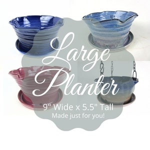 May include: Three ceramic planters in different colors: blue, purple, and blue with a white glaze. The planters are 9 inches wide and 5.5 inches tall. The text "Large Planter" is superimposed on the image. The text "9" Wide x 5.5" Tall Made just for you!" is also superimposed on the image.