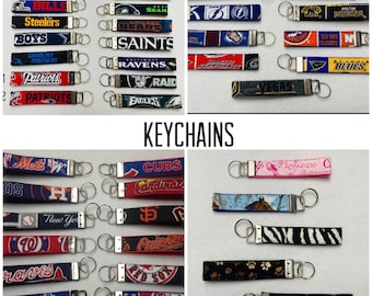 Fabric Wrist Keychains: /Football teams, Baseball teams, hockey teams, college teams, Cancer Ribbon, Misc./ Key Fobs/ Key Chains