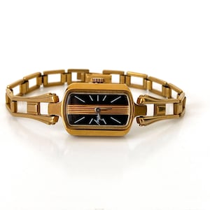 Vintage women&#39;s watch with solid bracelet and black face. Delicate ladies small watch. Dainty gold watch. Dainty vintage watch for women