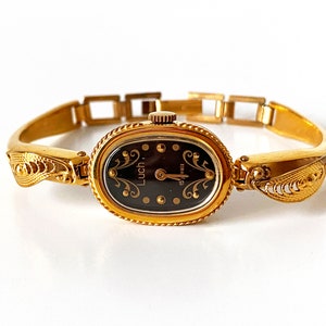 Vintage gold women's watches with black face. Timeless elegance. Retro Chic. Timeless charm women. Watches for women. Vintage women's watch