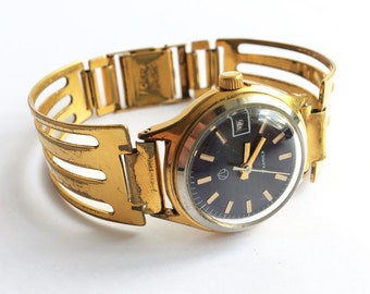 Vintage women's golden watch with black dial. Solid bracelet watch. Bangle bracelet watch. Large face women's watch. Gold cocktail watch