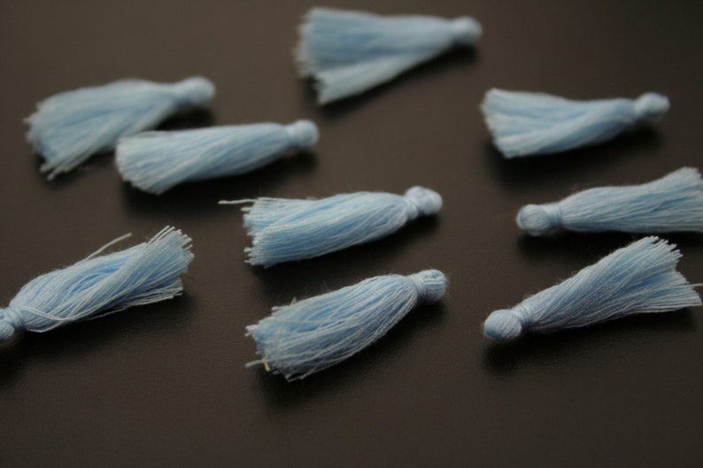 ref:4506 . Set of 6 small PomPoms.