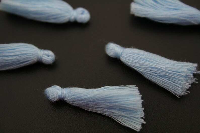 ref:4506 . Set of 6 small PomPoms.