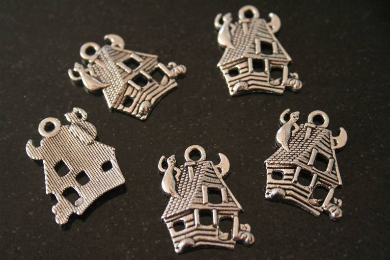 ref:2322 20 antique silver charms. .
