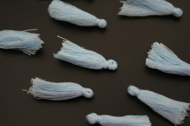 ref:4506 . Set of 6 small PomPoms.