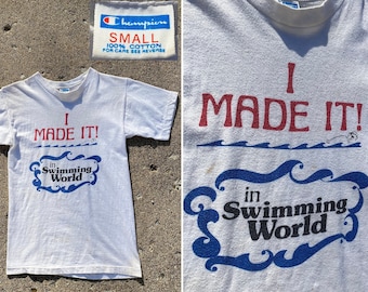 Vintage 70s "I Made It In Swimming World" CHAMPION T-Shirt XS | 1970s original swim extra-small single-stitch athletic throwback varsity