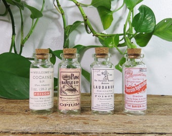 4 Apothecary Bottles Small 2.5" glass Bottles Laudanum, Cocaine, Opium, Heroin EMPTY REPLICAS/REPRODUCTION labels