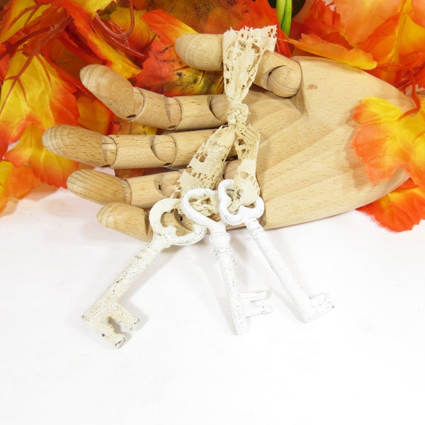 3 Shabby White Skeleton keys- Cast Iron decorative replica keys on vintage fabric 2.75"-3" WK6