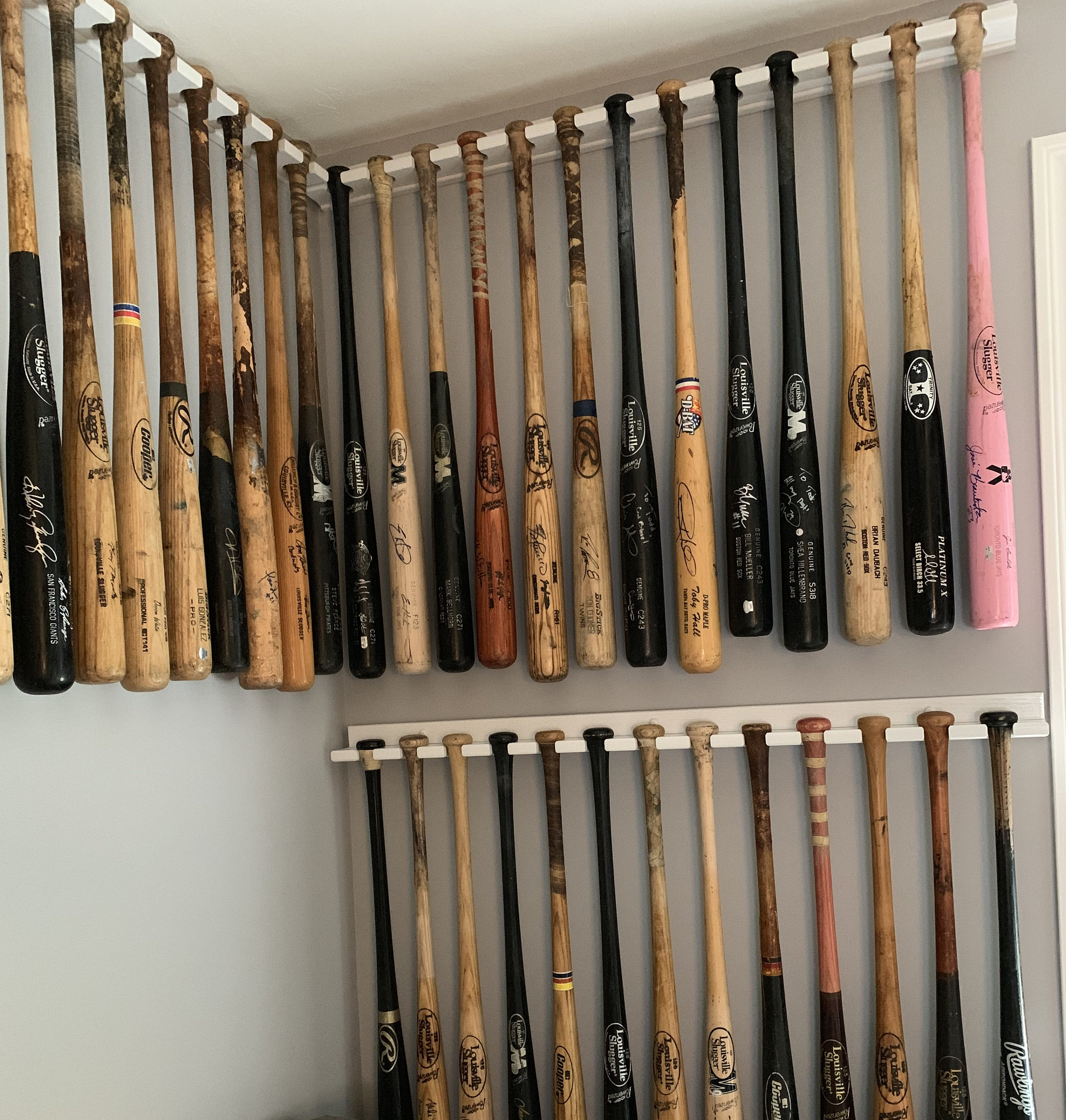 Vertical baseball bat display rack for regular bats (Priced by the inch