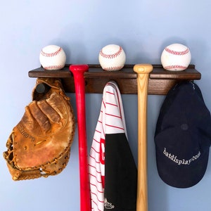 Baseball bat rack with baseball shelf, hat and jersey hangers
