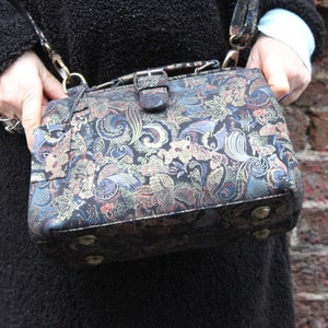 Doctor bag, Printed leather, Internal pockets, External back patch pocket, Adjustable strap, Ornate leather, Gladstone style bag, Metal feet