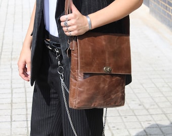 Crossbody, Flapped bag, Dark brown, Extra zip purse attached, Back pocket, Front pocket under flap, Long adjustable strap, Internal pockets