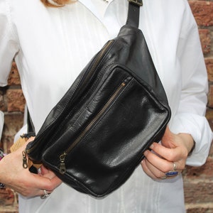 Black Leather Bum bag, Belfast, Chest bag, Hip bag, Two pockets, Ykk zips, 2 zips, Top zip 30cms, Inner zip pocket, Adjustable Buckled strap