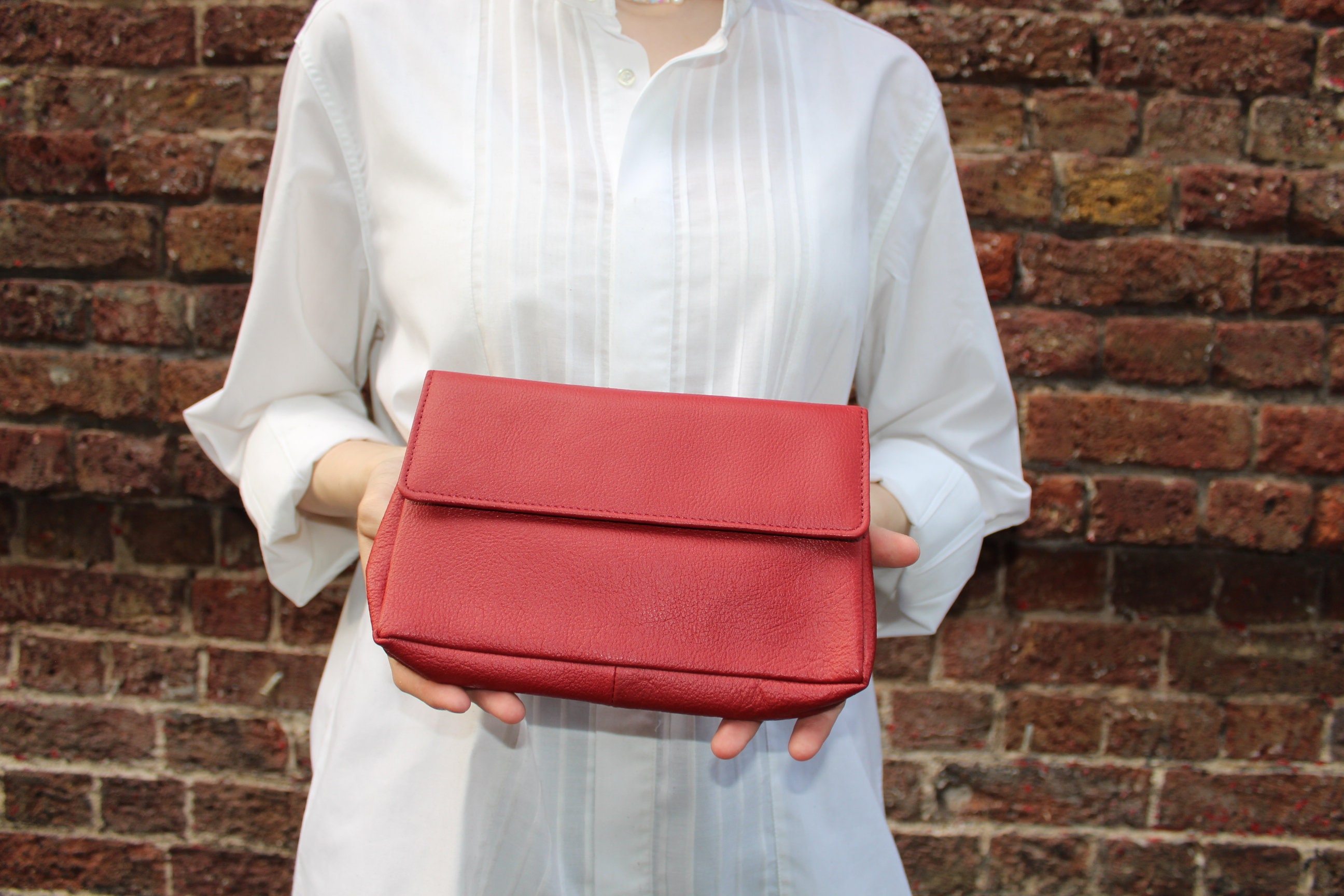 Red leather clutch best sale bag