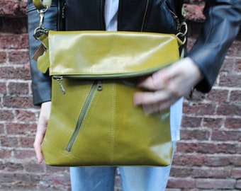 Amelie Apple Green Leather Messenger Bag with slanted front pocket and back pocket, Adjustable Strap, Internal compartments, Laptop bag