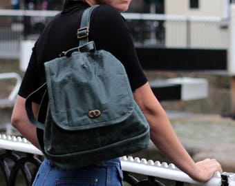 Mochila de cuero desgastado azul marino: estilo vaquero España