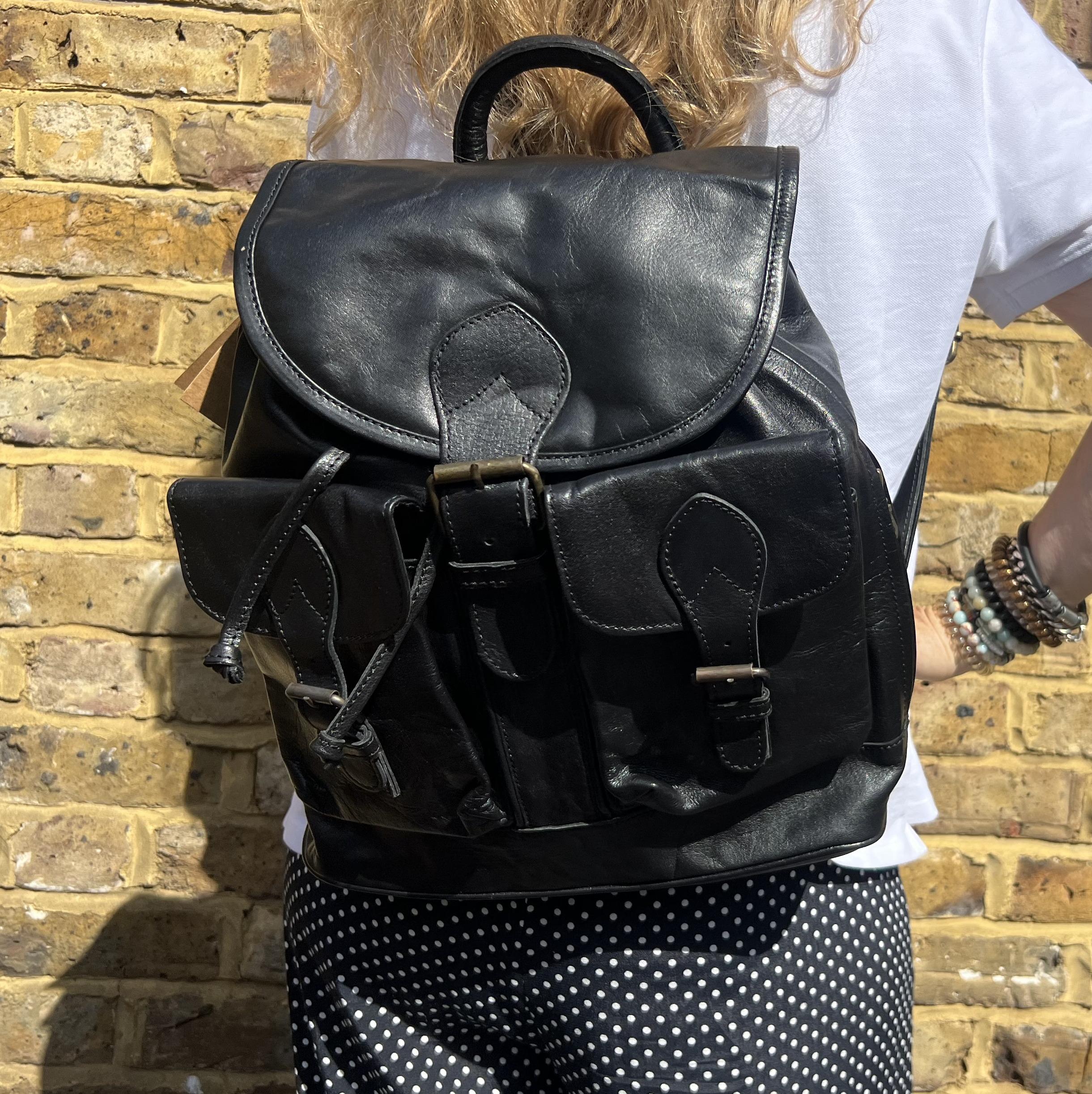 clava black leather drawstring backpack Abby Full-Grain Black, Handcrafted in Ethiopia 16.5L x 13W x 6.5H Weight Clava Drawstring Backpack