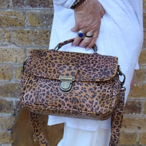 Leopard print genuine leather mini satchel,Push lock sling bag,Multi compartment,Back pocket,Durable black lining, Adjustable strap, Funky