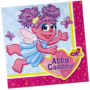 May include: A pink fairy with purple hair and blue wings flies with a heart-shaped banner that says "Abby Cadabby". The background is pink with white stars.