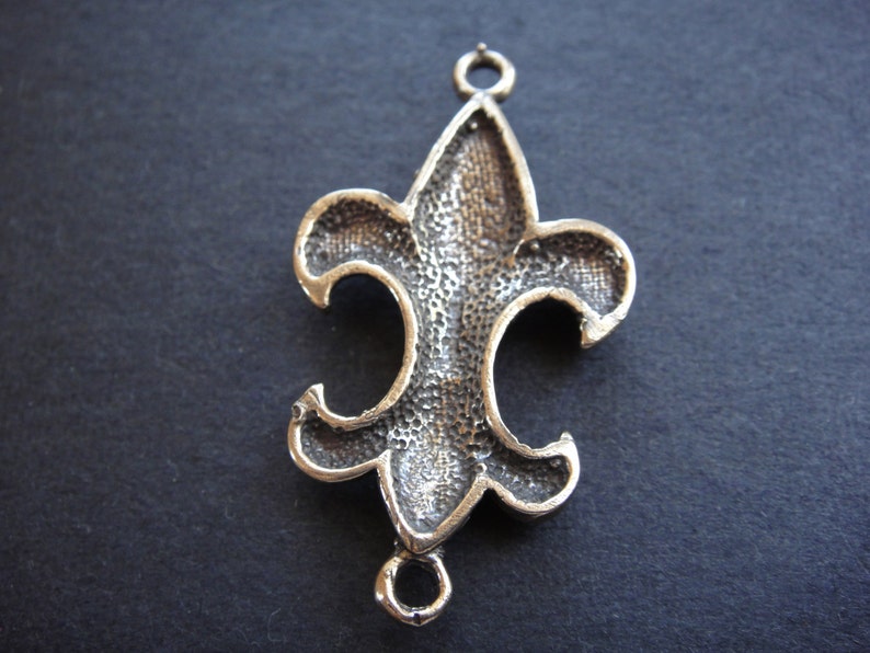 solid bronze large fleur de lis connector fleur de lis connector