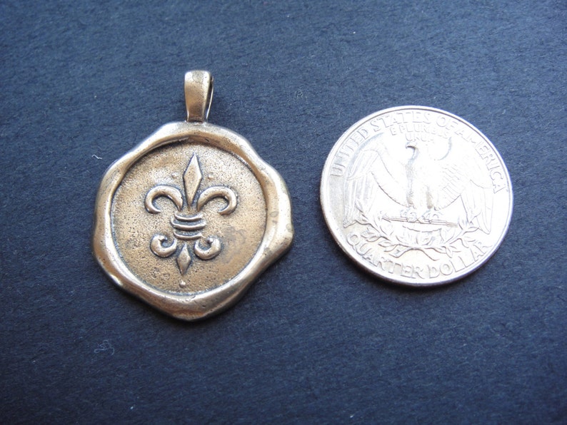 solid bronze large fleur de lis connector fleur de lis connector