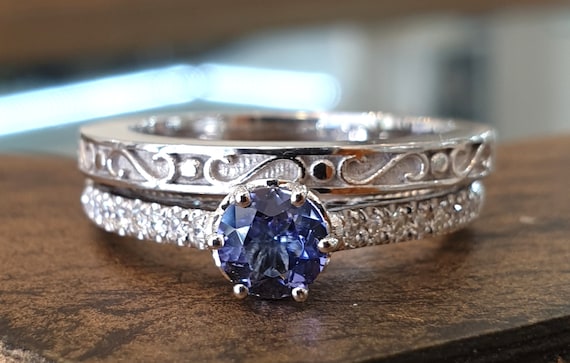 French Modern Platinum Ring with Tanzanite and Diamonds for sale at Pamono