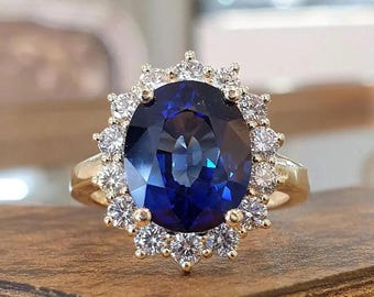 Princess Diana Inspired Ring: 4CT Oval Blue Sapphire, 14K Yellow Gold, Diamond Halo
