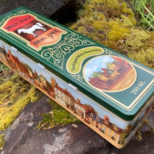 Vintage &quot;The Original White Horse Cellar&quot; Empty Scotch Whiskey Tin Box w/ Hinged Lid and Village Scene w/ Horses (Produced in Scotland)