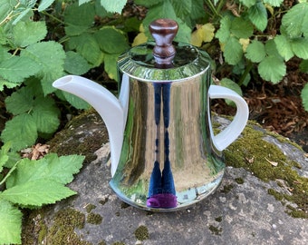 Vintage Mid-Century Modern White Ceramic Teapot with Silver-Tone Insulated Tea Cozy