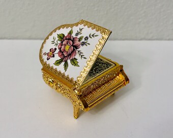 Vintage Westland Co. Japan Miniature Ornate Gold Tone Piano Music Box/Trinket Box w/ Enamel Rose, Plays "Music of the Night" (Made in Japan)