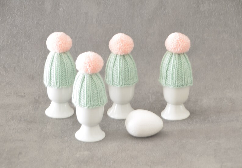 knitted egg warmer for table decoration sale per piece egg cosies in mint with rose pompom little gifts for guests bright spring decor