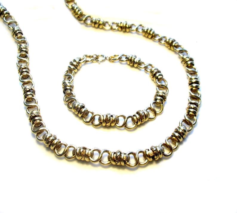 long chain gold plated necklace and bracelet Long gold plated necklace and bracelet .50s