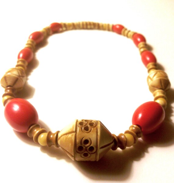Vintage 40s Red and Carved Off White Bone Look Cel