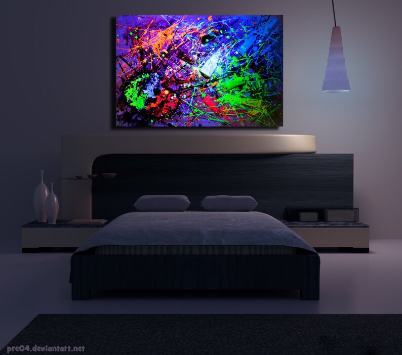 May include: A modern bedroom with a dark wood headboard and a white bedspread. A large abstract painting with splashes of bright colors hangs above the bed. A single light fixture hangs from the ceiling.
