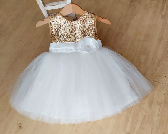 white dress with gold sequins