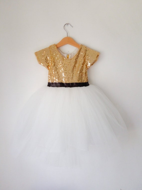 white dress with gold sequins