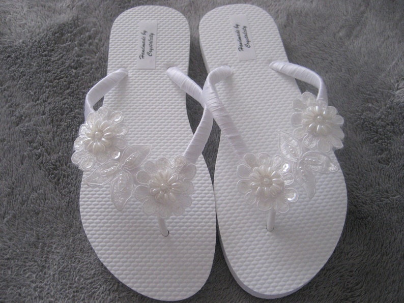 white bling flip flops
