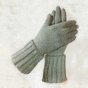 May include: A pair of sage green knitted gloves. The gloves have a ribbed cuff design and a textured knit pattern. The gloves are made of a soft, warm material, perfect for cold weather. The gloves are shown on a white background.