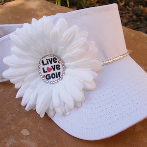 Womens Golf Sun Visors and GOlf Hats all done with swarovski crystals and your choice of center emblem scroll through pictures to see