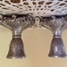 Elegant pair of baroque style silver metal candle holders