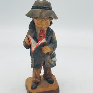 Vintage hand carved and hand painted Carving Little Boy Holding Book, Jobin Brienz Switzerland. figurine image 2