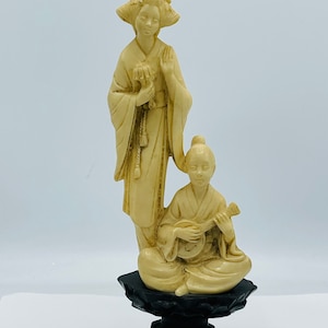 NORLEANS 10 Carved Resin Figurine Asian Woman Boy Playing Sitar Ivory-Look Wood Stand Nice Condition image 1