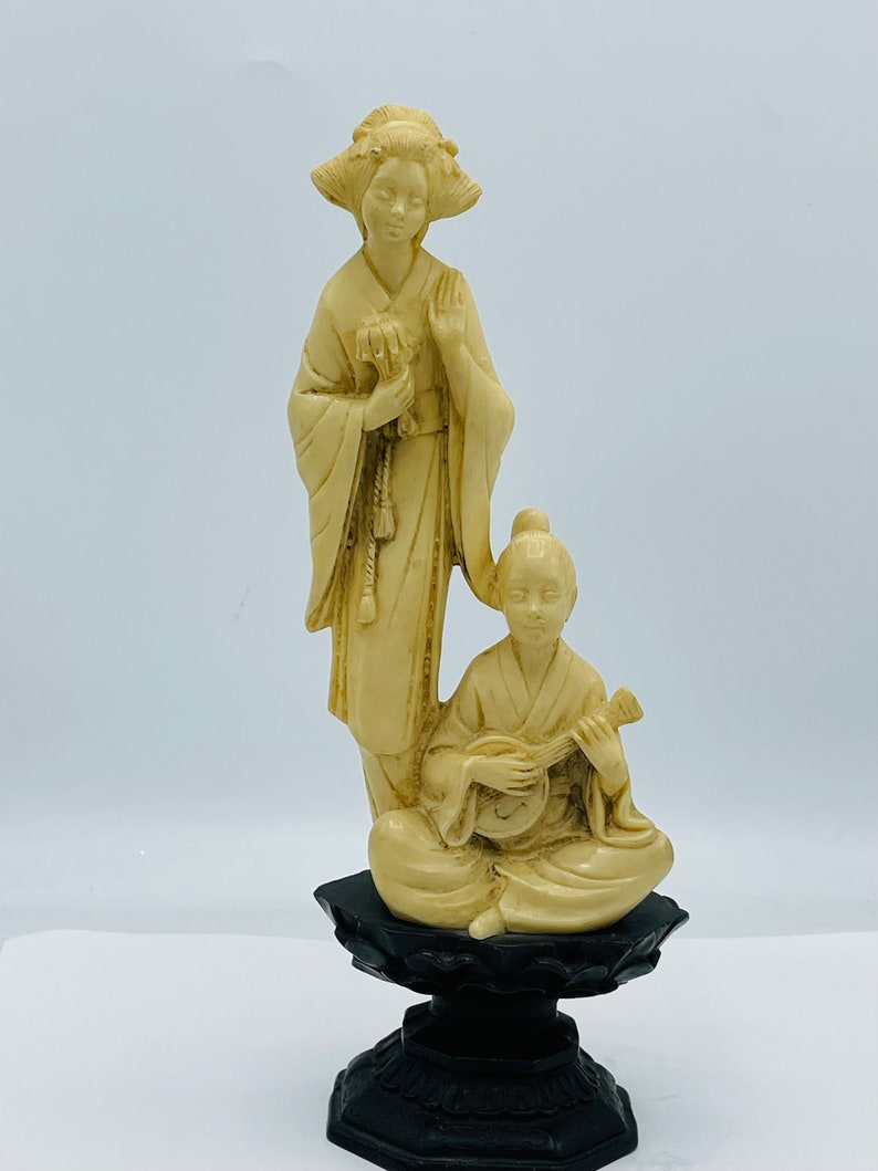 NORLEANS 10 Carved Resin Figurine Asian Woman Boy Playing Sitar Ivory-Look Wood Stand Nice Condition image 1