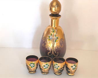 Lovely Vintage Bohemium - Boho-Hand painted Decanter and 4 shot cordial glasses - Gold Overlay Trim and Purple glass and hand painted flower